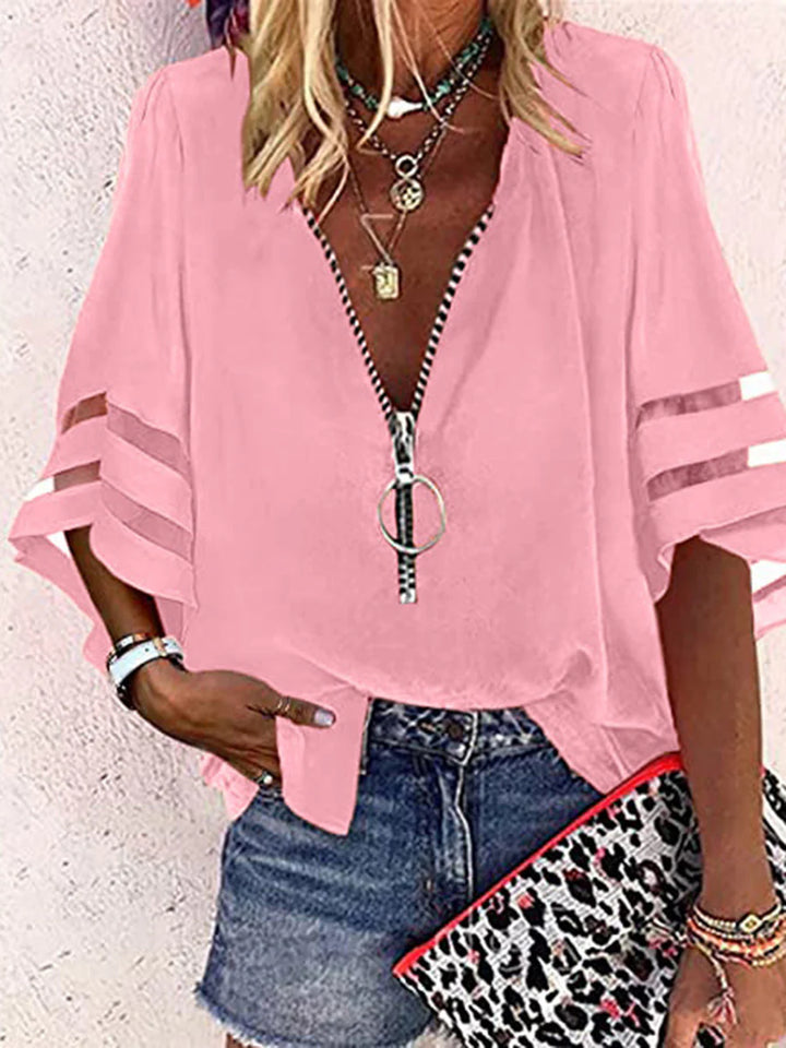 BLUSA FOLGADA DE MANGA TRÊS QUARTOS COM BAINHA, FECHO E GOLA MANDARIM