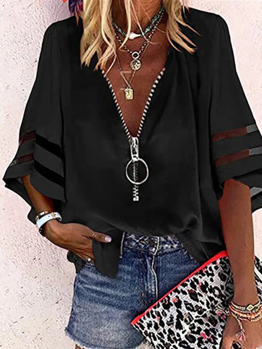 BLUSA FOLGADA DE MANGA TRÊS QUARTOS COM BAINHA, FECHO E GOLA MANDARIM