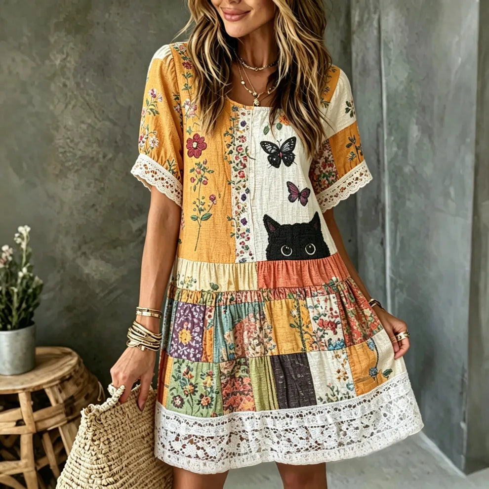 Vestido mini hippie con bordado gato negro cuello redondo