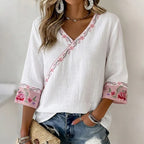 Top casual con bordado floral artístico