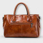 Flora | cartera baúl elegante