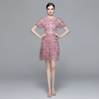 VESTIDO MINI TUL FLORAL ROSA CON CUELLO PETER PAN Y VOLANTES K26061502