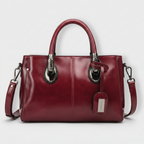 Flora | cartera baúl elegante