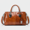 Flora | cartera baúl elegante