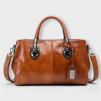 Flora | cartera baúl elegante